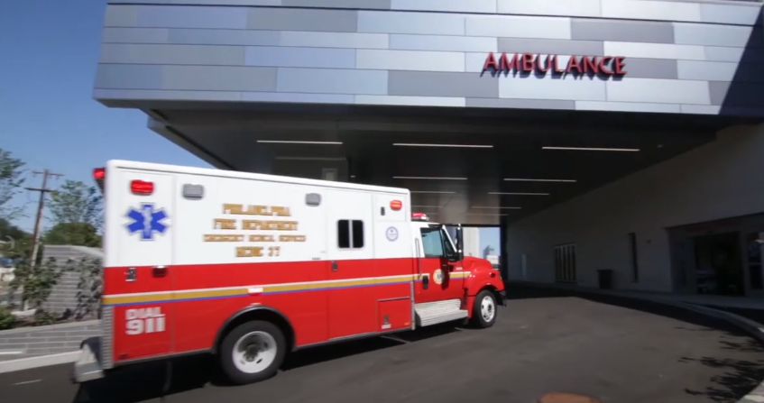 Ambulance entering emergency of hospitol